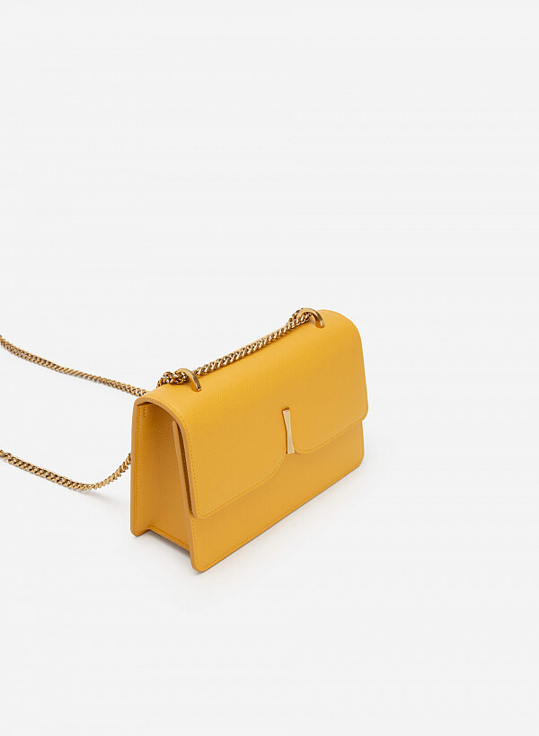 Túi đeo chéo khóa kim loại hình nơ dây quai xích - SHO 0193 - Màu vàng - VASCARA