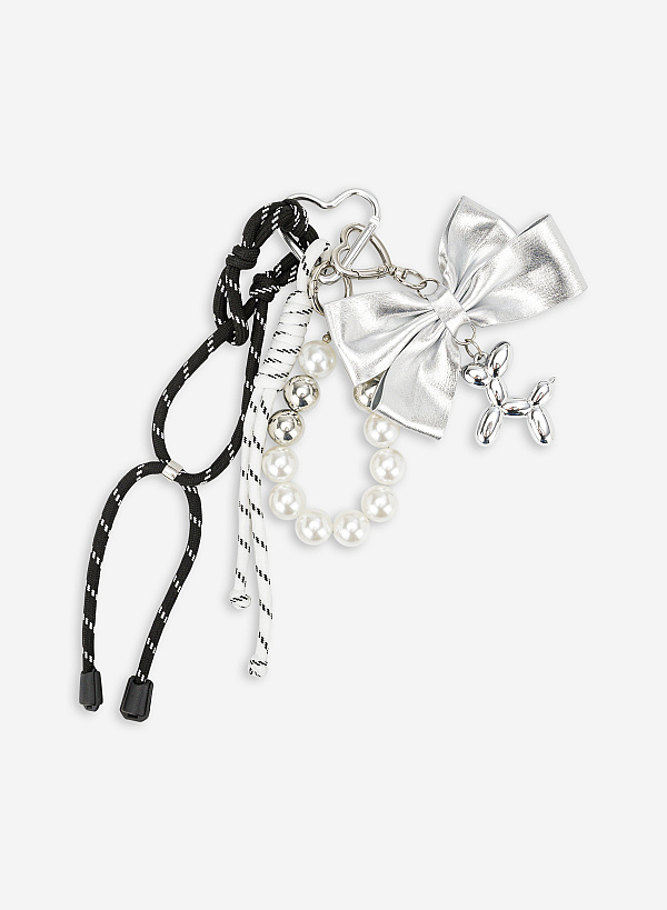 Charm dây nơ bạc phối ngọc trai