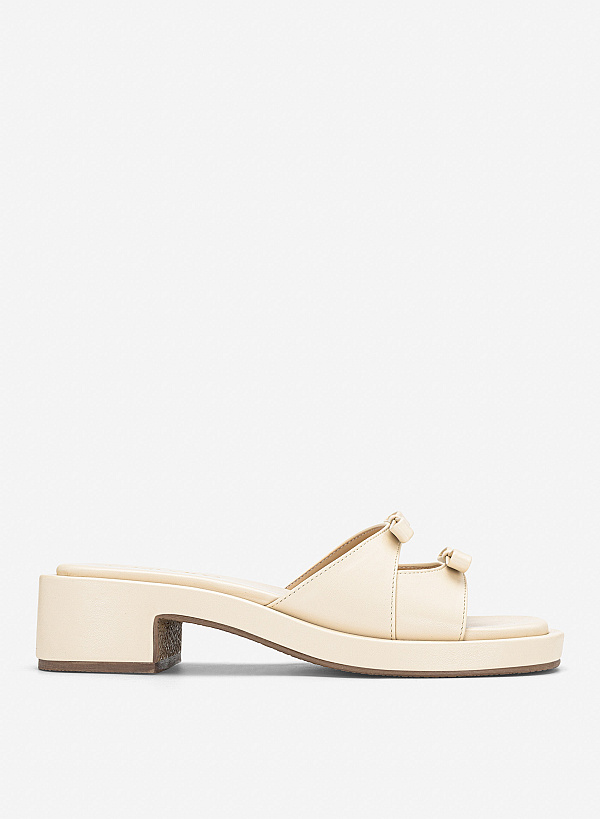 Guốc mules phối nơ trang trí