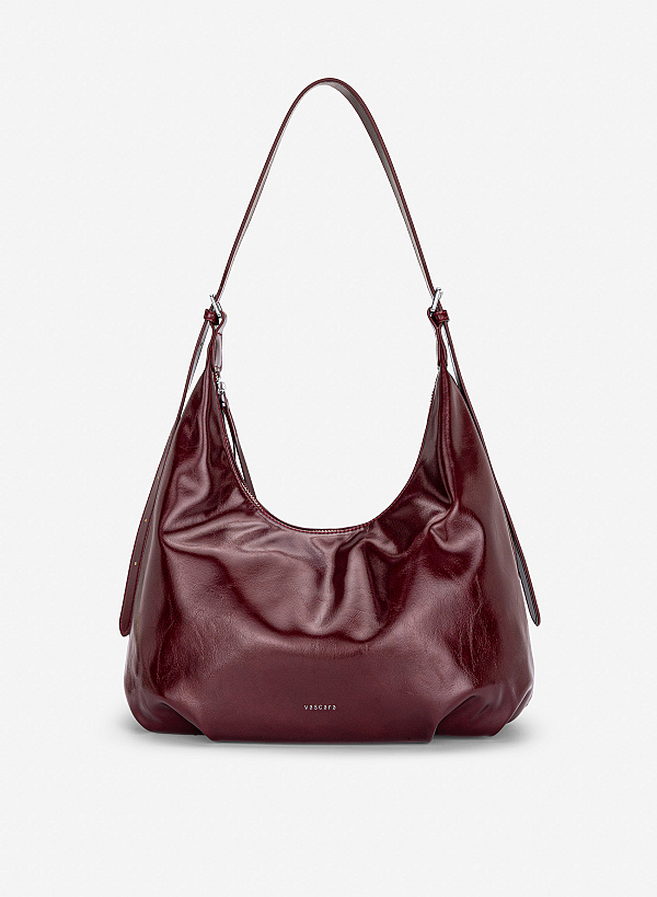 Túi đeo vai phom mềm nhấn khóa kéo