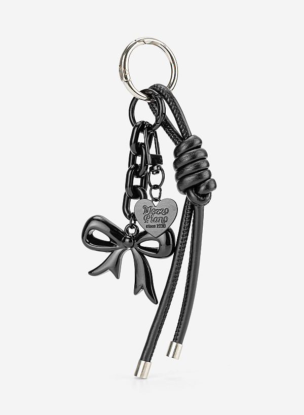 Charm dây kim loại đính nơ đen