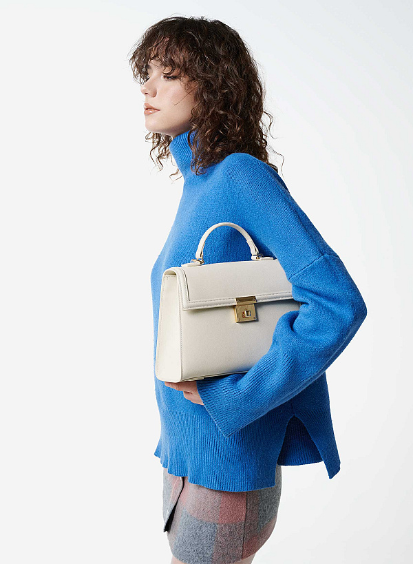 Túi da sang trọng dáng nắp gập nhấn khóa