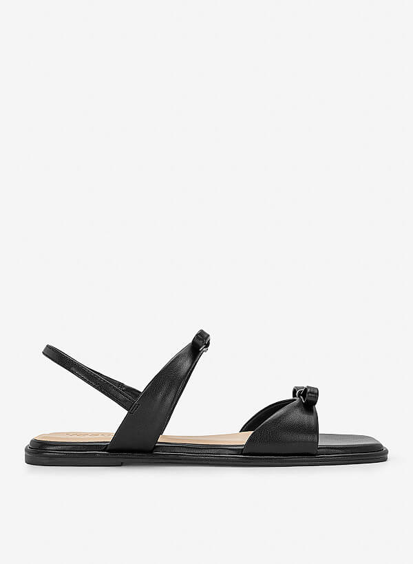 Sandal đế bằng họa tiết nơ cá tính