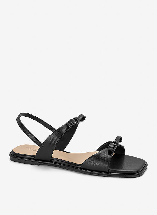 Sandal đế bằng họa tiết nơ cá tính