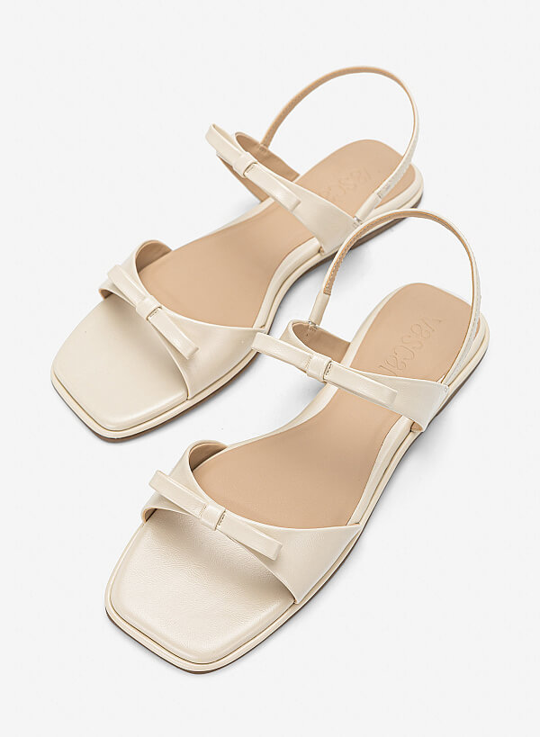 Sandal đế bằng họa tiết nơ cá tính - SDK 0355 - Màu kem - VASCARA
