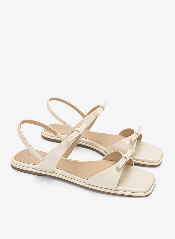 Sandal đế bằng họa tiết nơ cá tính - SDK 0355 - Màu kem - VASCARA