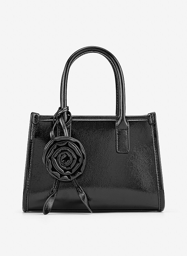 Túi mini xách tay nhấn charm hoa hồng